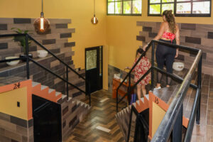Entrance stairway and common area inside Cayala mixed dorm at Greengo’s Hotel