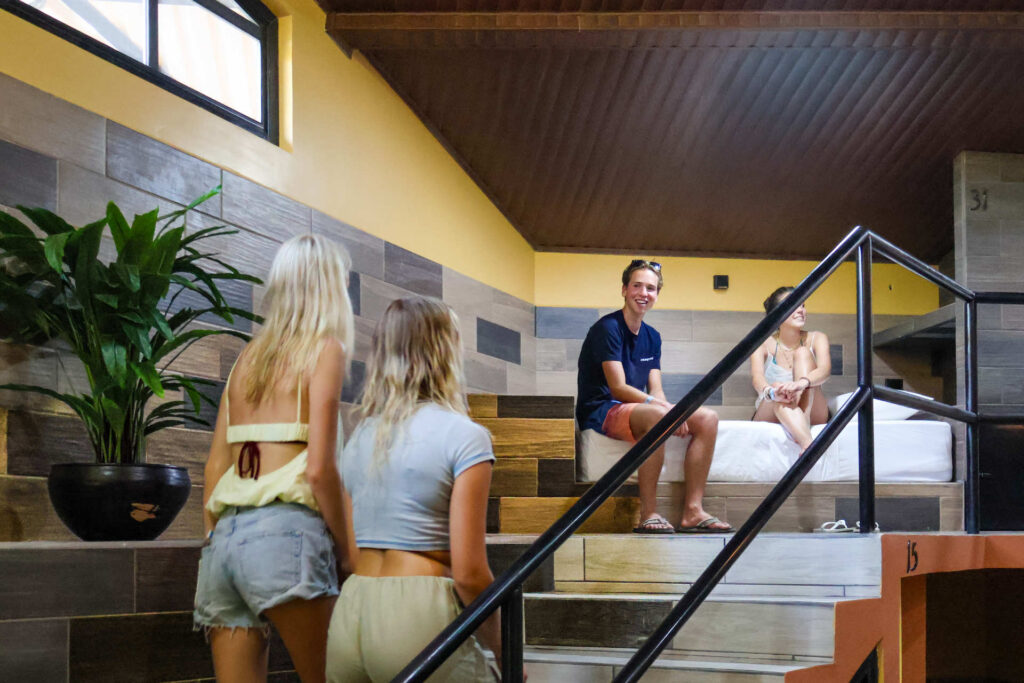 Cayala mixed dorm with capsule-style beds and shared lounge area at Greengo’s Guatemala