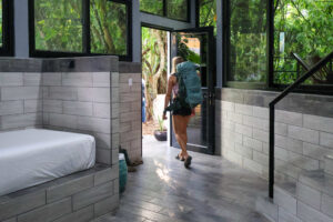 Entrance foyer inside Isla Mujeres female dorm surrounded by jungle scenery