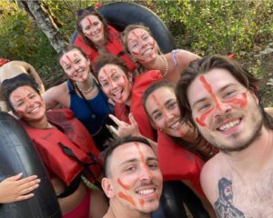 Friends enjoying Extreme Tubing tour with river floats and jungle views in Guatemala