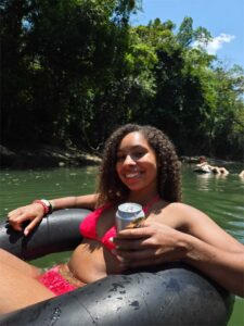 Guest relaxing in river tube during guided Extreme Tubing experience in Semuc Champey