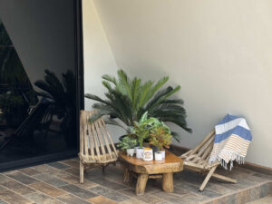 Relaxing private terrace with chairs and tropical plants at Garden Cabaña