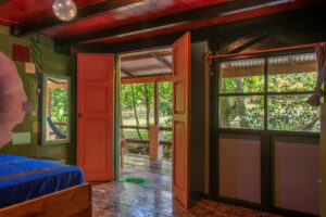 Open-air Riverside Room entrance with balcony and riverfront views at Greengo’s
