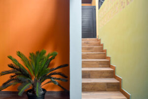 Colorful stairway and foyer inside El Barrio at Greengo’s Guatemala