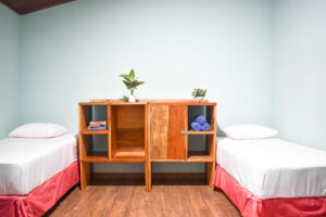 Triple semi-private room with modern decor in El Barrio at Greengo’s Guatemala