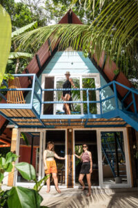 Exterior of original wooden cabañas featuring Cozy Nook semi-private rooms at Greengo’s