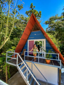 A-frame PoolFront Loft exterior with private balcony overlooking the pool area